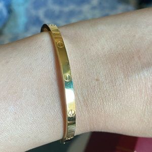 Cartier love Bracelet Small size, yellow gold.